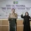 Asisten Administrasi Umum (Asda III) Pemkab Ciamis Wawan Ruhyat membacakan sambutan tertulis Bupati Ciamis pada pembukaan Seminar Hari Tuli Nasional di Aula Dinas Pendidikan Kabupaten Ciamis, Minggu (11/1/2026).